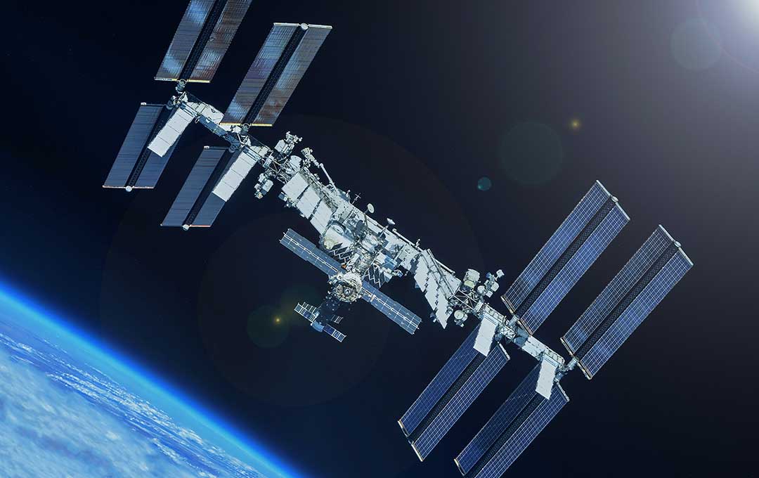 A large satellite in space above Earth